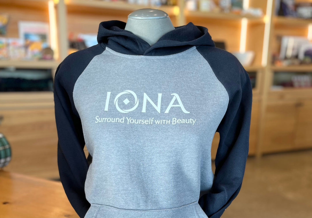 Grey and navy hoodie with 'Iona' logo
