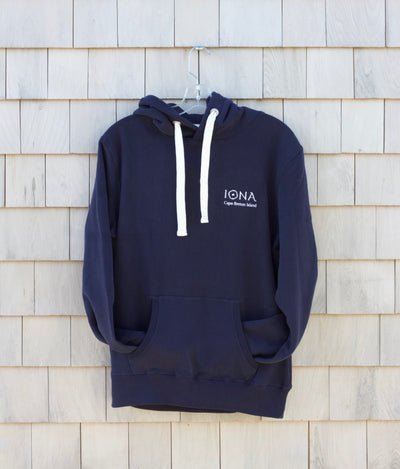 Navy Coloured Hoody with white drawstrings. Embroidered logo which says 'Iona Cape Breton Island'